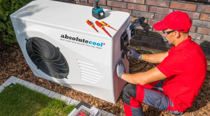 technician repairing heat pump in Auckland