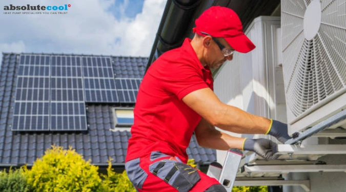 Handyman repairing Heat Pump